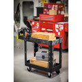 Just Launched | Rubbermaid Commercial FG450088BLA 17.13 in. x 38.5 in. x 38.88 in. 500 lbs. Capacity 2 Lipped Shelves Heavy-Duty Plastic Utility Cart - Black image number 4