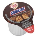 Condiments | Coffee-Mate 12384196 0.38 oz. Mini Cups Liquid Coffee Creamer - Snickers (50/Box) image number 1