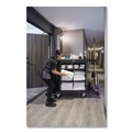 Cleaning Carts | Rubbermaid Commercial 2202581 24.4 in. x 62.4 in. x 49 in. Full-Size 3-Shelf Housekeeping Cart - Black image number 4