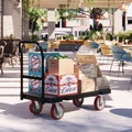 Cleaning Carts | Suncast Commercial PDPT2448 24.25 in. x 52.25 in. x 41 in. 1,600 lbs. Capacity Resin Platform Truck - Black image number 1